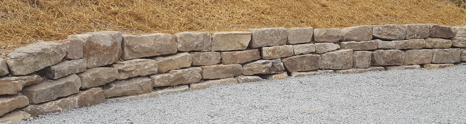 McGinn Hardscaping - Barn Stone Retaining Wall